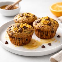 Zucchini Muffins with Chocolate Chips and Honey Orange Glaze
